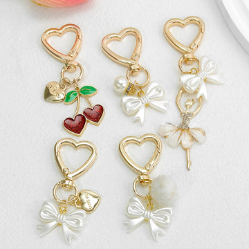 Gold Heart Clasp Charm Keychain With Bow Cherry Accent