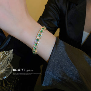 Gold Tone Open Cuff Bracelet With Green And Clear Crystal Rows