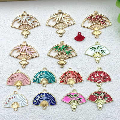 Colorful seashell charms arranged on a light background