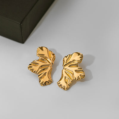 Primary supplied view of abstract crinkled leaf pair stud earrings