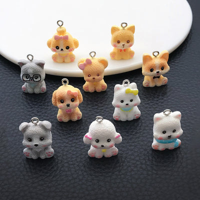 Multicolor assorted shape charms arranged on a light background