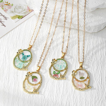 Gold Tone Oval Pressed Flower Frame Pendant Necklaces
