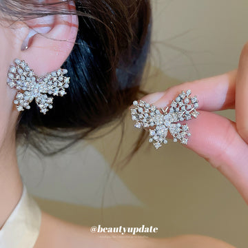 Silver Tone Crystal Butterfly Stud Earrings With Layered Wings
