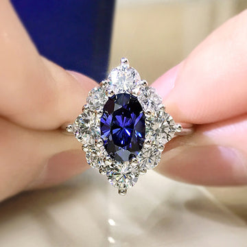 Deep Blue Oval Floral Cluster Statement Ring In Silver Tone