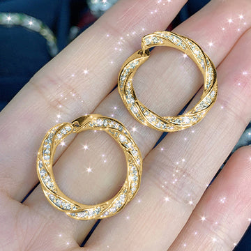 Twisted Clear Crystal Pavé Hoop Earrings in Gold Tone