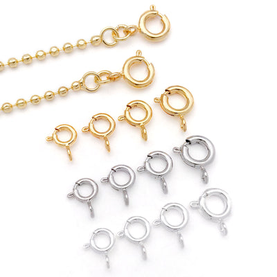 Front overview of round spring clasps in four graduated sizes arranged by finish and size