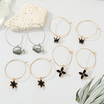 Gold Tone Black Enamel Symbol and Wine Bottle Hoop Drop Earrings