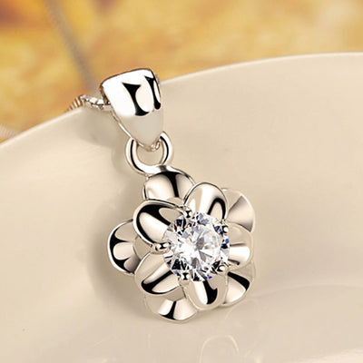 Silver Tone flower frame pendant shown in front detail view