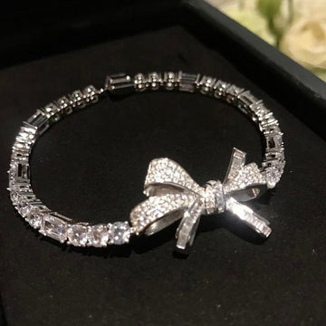 Silver Tone Clear Baguette Crystal Bracelet With Bow Center