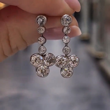 Silver Bezel Graduated Flower Drop CZ Dangle Earrings