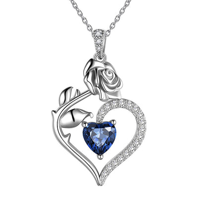 Silver rose heart blue stone pendant necklace front close-up white