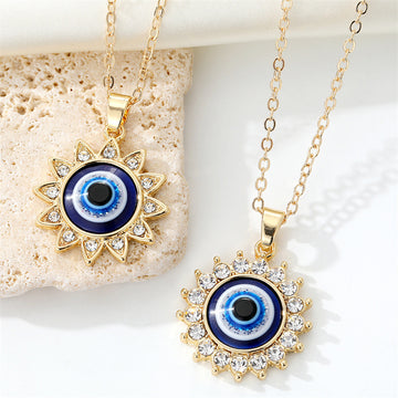 Gold Tone Crystal Sun Blue Evil Eye Pendant Necklaces in Two Designs