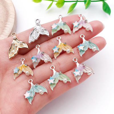 Colorful starfish charms arranged on a light background