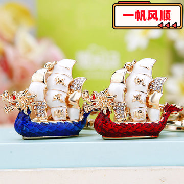 Dragon Sailboat Keychain with White Sails and Jeweled Enamel Hull