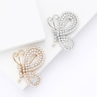 Product display showing an airy butterfly outlined with rows of pearls and clear crystals