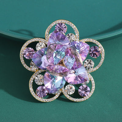 Front view of large Layered Crystal Flower Brooch in Blue or Purple against a white background.