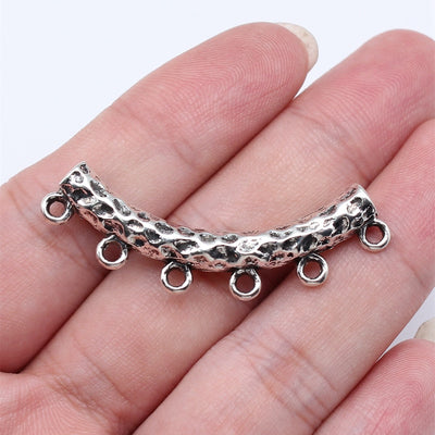 Hammered Curved Six-Loop Connector hand-held front view
