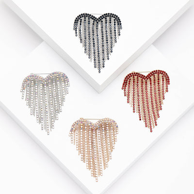 Front view of the crystal heart fringe brooch in six jeweled color finishes brooch and its color options