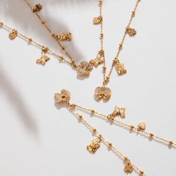 Gold Multi-Charm Satellite Necklace Pavé Bow Butterfly Heart