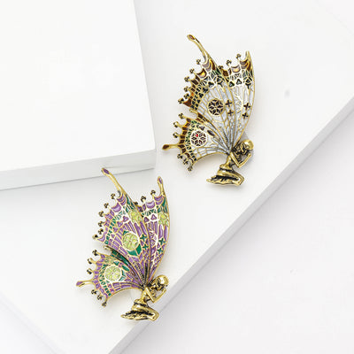 Enamel Butterfly Fairy Brooch shown against a white display background