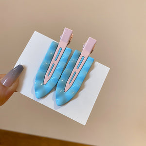Pair Of Blue Painted Triangle Duckbill Hair Clips With Pink Backs