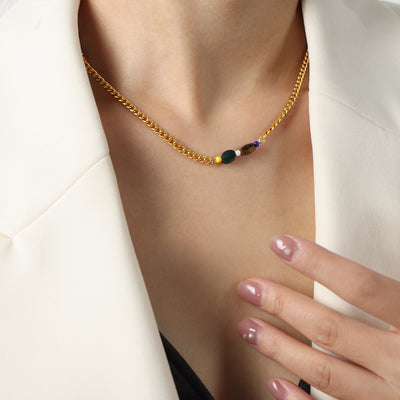 Gold curb chain necklace multicolor stone side stations on model