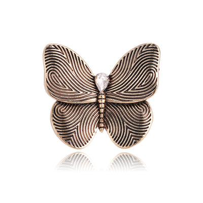 Front product view of the butterfly brooch pin in gold and red