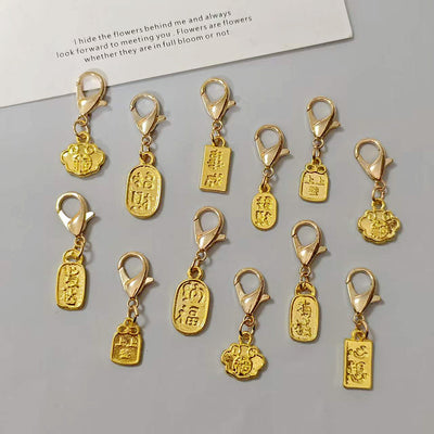 Main product view of gold Tone Chinese Good-Fortune Tag Lobster-Clasp Charms in Six Designs