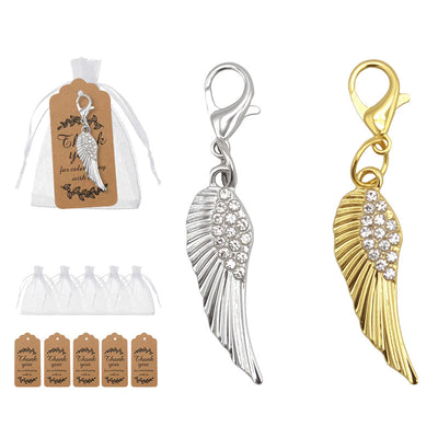 Gold and silver rhinestone angel wing charms with bags and tags