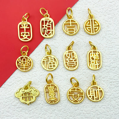 Metallic assorted shape charms arranged on a light background