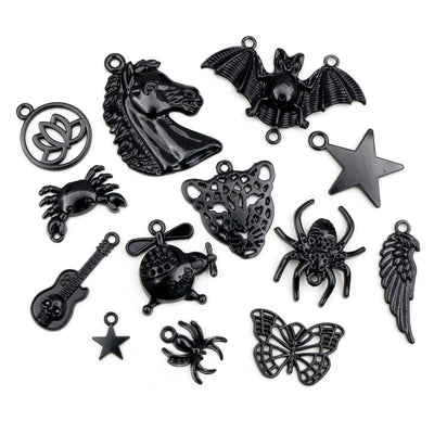 Assorted black bat spider wing and animal pendant charm mix arranged together in the main product view