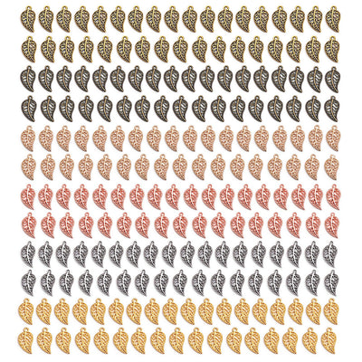 Gold-tone leaf charms arranged on a light background