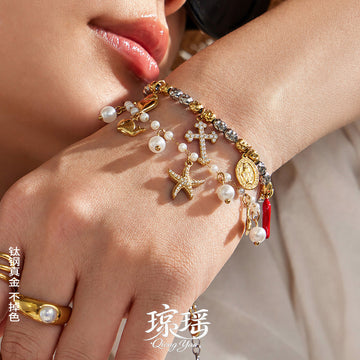 Ocean Charm and Cross Charm Bracelets in Two Metal Tones