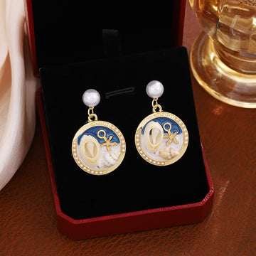Eleven Ocean Scene Pearl Look Medallion Stud Earrings