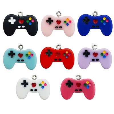Colorful assorted shape charms pictured with visible surface details