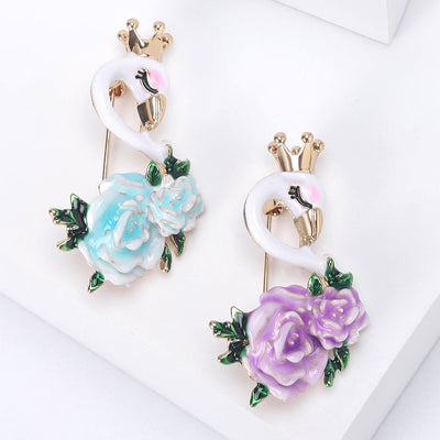Crowned Swan and Rose Flower Brooch isolated front view
