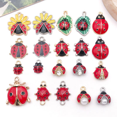 Colorful insect charms arranged on a light background