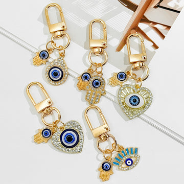 Gold Evil Eye Hamsa Hand Keychain With Blue Eye Charm