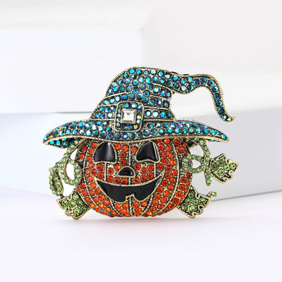 Product display showing an orange jack-o-lantern beneath a curling blue crystal hat