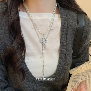 Layered White Pearl Look Cross Pendant Necklace with Metal Tone Details
