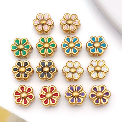 Colorful daisy beads arranged on a light background