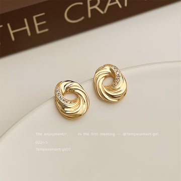 Gold Twisted Cookie Swirl Zircon Stud And Clip Earrings
