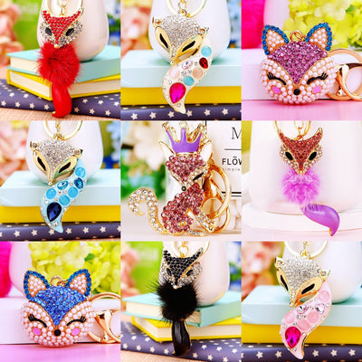 A styled group view shows the fox keychain and its attached hardware.