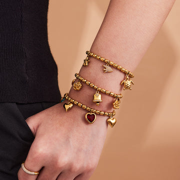 Bell Flower Marine and Heart Charm Bracelet Collection in Three Finishes