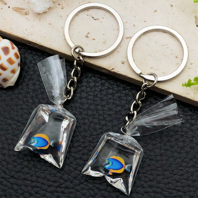 Overview showing the available color and design variations of the mini fish keychains and phone strap charms