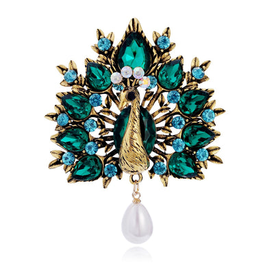 Front product view of an emerald green brooch
