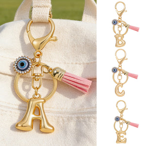 Gold Tone Initial Keychains A to L with Eye Charm and Pink Tassel