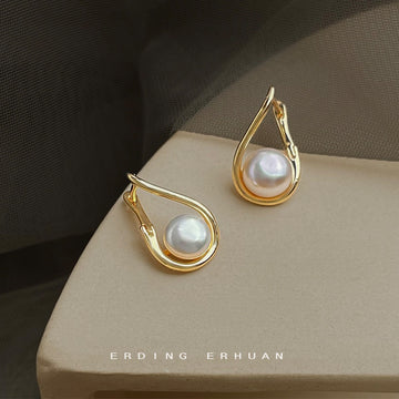 Gold Tone Open Teardrop Frame And White Pearl Stud Earrings