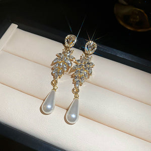 Gold Tone Leaf Crystal Earrings with Faux Pearl Drops