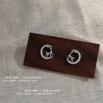 Silver Reindeer Silhouette Stud Earrings in Clear Crystal Circles